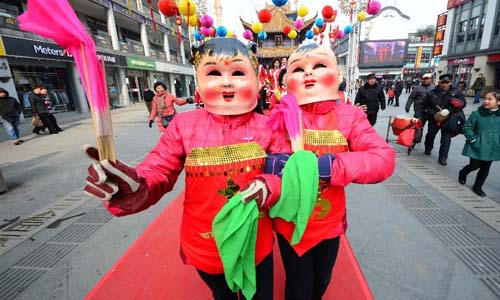 Performers dance at a local event celebrating Chinese Lunar New Year, or Spring Festival, in Wuxi City, east China's Jiangsu Province, Feb. 10, 2013. Various activities were held all over China on Sunday to celebrate the Spring Festival, marking the start of Chinese lunar Year of the snake. The Spring Festival falls on Feb. 10 this year