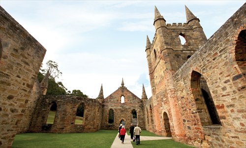 Port Arthur's Gothic church was destroyed in a bushfire over a century ago. Today, only its eerie stonework remains.Photos: Courtesy of Sue Murray/Tourism Tasmania