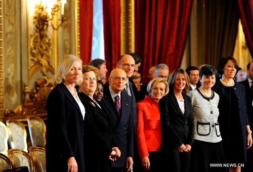 Italian President Giorgio Napolitano (4th L) poses with several new cabinet members at the swearing-in ceremony in Rome, Italy, on April 28, 2013. Italy's new cabinet, lead by Prime Minister Enrico Letta, was sworn in on Sunday, starting their task for breaking the impasse the country had been locked for months. (Xinhua/Xu Nizhi)  