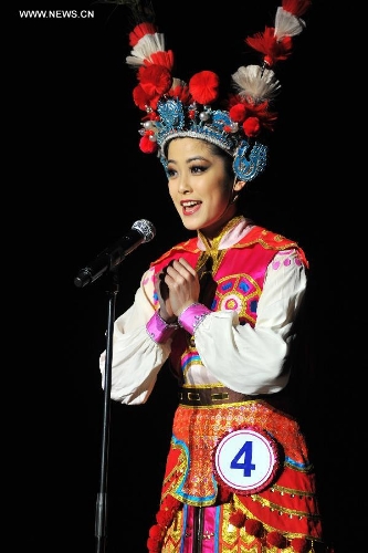Leah Li, the winner of the Miss Chinatown U.S.A. Pageant 2013, performs during the rehearsal of the pageant in San Francisco, the United States, Feb. 15, 2013. The Miss Chinatown U.S.A. Pageant 2013 closed on Feb. 16. (Xinhua/Liu Yilin)