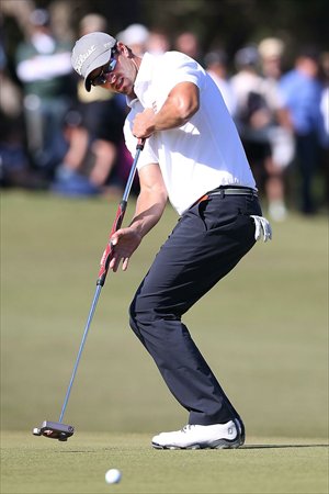 Adam Scott of Australia putts the ball during the final round of the 2013 Australian Masters at the Royal Melbourne Golf Club on Sunday. Photo: CFP