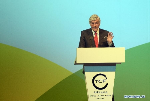 Former Prime Minister of the Netherlands Ruud Lubbers delivers a speech at the opening ceremony of the second World Cultural Forum (Taihu, China) in Hangzhou, capital of east China's Zhejiang Province, May 18, 2013. Established in 2007 as a non-governmental organization based in China, the World Cultural Forum (Taihu, China) is committed to creating an open, multilateral and inclusive platform for international cultural exchanges. (Xinhua/Han Chuanhao) 