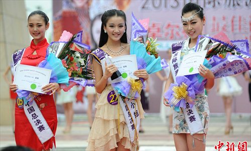 The China Final of 2013 Miss Tourism International rang down the curtain in Huangpi District of Wuhan, capital of central China's Hubei Province, May 5, 2013. Photo: Chinanews.com