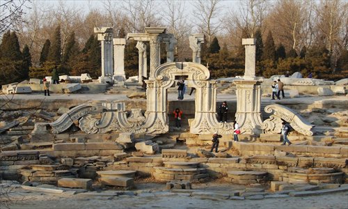 Amid the ruins of the Old Summer Palace, a symbol of national humiliation. Photo: CFP
