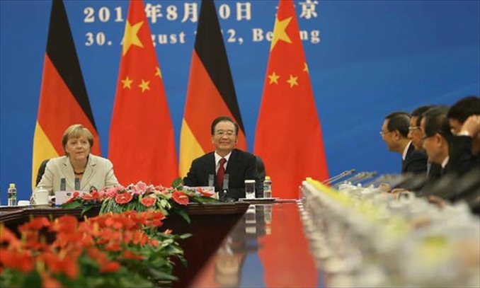 Chinese Premier Wen Jiabao (2nd L) and German Chancellor Angela Merkel co-chair the second round of Chinese-German intergovernmental consultations at the Great Hall of the People in Beijing, capital of China, Aug. 30, 2012. Photo: Xinhua
