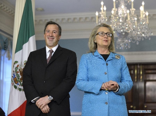 U.S. Secretary of State Hillary Clinton (R) speaks with Mexican Foreign Secretary Jose Antonio Meade at the Department of State in Washington D.C., capital of the United States, Jan. 30, 2013. It was the last bilateral meeting for Hillary Clinton as Secretary of State. (Xinhua/Zhang Jun) 