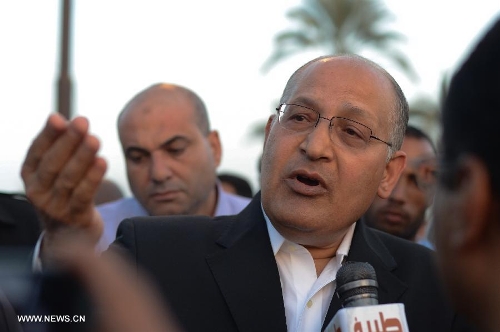 Luxor governor Ezzat Saad receives interview after a mourning ceremony in Luxor, Egypt, on March 1, 2013. Luxor governorate held a mourning ceremony here for the victims of the explosion.(Xinhua/Li Muzi)