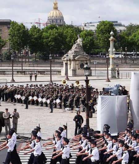 French soldiers attend the annual Bastille Day military parade in Paris, France, July 14, 2012. Under grey sky of a windy day, French President Francois Hollande celebrated his first-ever National Day (known outside of France as Bastille Day) as head of state on Saturday with usual pomp, military parade and flight show. Photo: Xinhua
