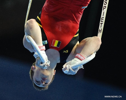 Belgium's Jimmy Verbaeys competes on the rings during the 5th Men's and Women's Artistic Gymnastics Individual European Championships in Moscow, Russia, April 18, 2013. The event kicked off here on Wednesday. (Xinhua/Jiang Kehong) 