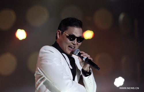 South Korean singer Psy sings his hit single 