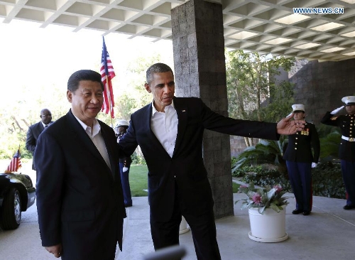Chinese President Xi Jinping is greeted by U.S. President Barack Obama at the Annenberg Retreat, California, the United States, June 7, 2013. Chinese President Xi Jinping and his U.S. counterpart, Barack Obama, met Friday to exchange views on major issues of common concern. (Xinhua/Lan Hongguang) 