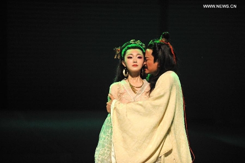 Actors Wang Ban (R) and Song Yi from Beijing People's Art Theater play drama 
