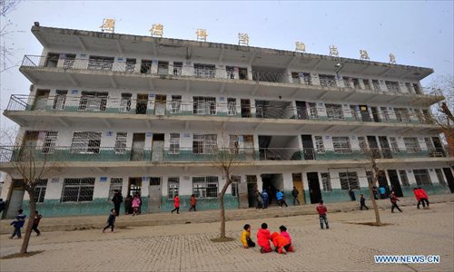 Photo taken on Feb. 27, 2013 shows the Qinji Elementary School, where a stampede accident took place, in Xueji County of Xiangyang, central China's Hubei Province. Four students were killed in a stampede accident here on Wednesday morning. Relevant departments of Xiangyang have rushed to the scene to carry out rescue efforts, and the injured have been sent to hospital for treatment. The cause of the accident is under investigation. Photo: Xinhua
