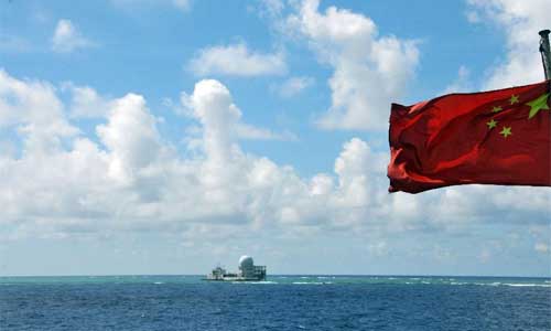 A fleet of fishing vessels arrive at Zhubi Reef of south China Sea on July 18, 2012. Photo: Xinhua