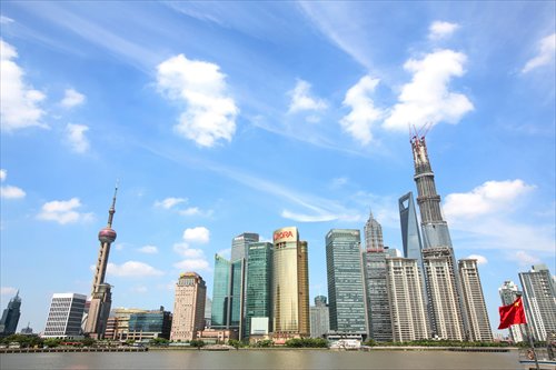 The skyline of the Lujiazui Financial District with the Oriental Pearl TV Tower (left) and other skyscrapers in Pudong, Shanghai, on August 15, 2013 Photo: IC