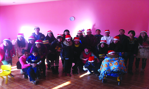 The children, volunteers and teachers in the Bethel Center in Changping district.  Photo: Courtesy of Nippon Paint China 