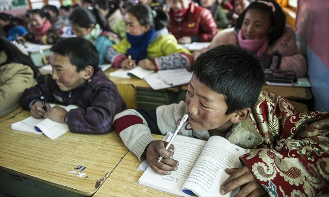 Local children study Tibetan at a bilingual primary school in Aba, Sichuan Province on March 4. Photo: Li Hao/GT