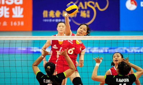 Yang Junjing (No.6) of China returns the ball to Thailand on the first day of the 2013 China International Women's Volleyball Tournament held in Shenzhen on Wednesday. China won the match 25-17, 25-20, 25-23. China will play Puerto Rico and Cuba on Thursday and Friday respectively. The one with the most wins among the four teams will win the tournament. Photo: CFP
