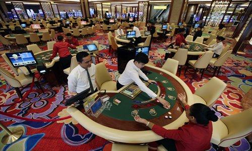 Casino card dealers during a simulated game inside the Solaire Resort and Casino in Manila, the Philippines, on March 14 Photo: CFP