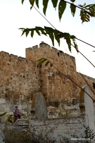 This photo taken on July 3, 2013 shows the Golden Gate of Jerusalem's Old City. Old City of Jerusalem and its Walls were recorded on the United Nations Educational, Scientific and Cultural Organization's World Heritage list in 1982. (Xinhua/ Yin Dongxun)