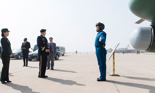 A pilot introduces equipment to Dempsey during his tour on April 24.