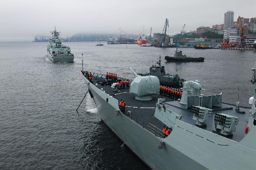 Chinese Navy vessels leave for joint naval drills from a port in Vladivostok, Russia, July 8, 2013. China and Russia started on Monday the joint naval drills off the coast of Russia's Far East. (Xinhua/Zha Chunming)  