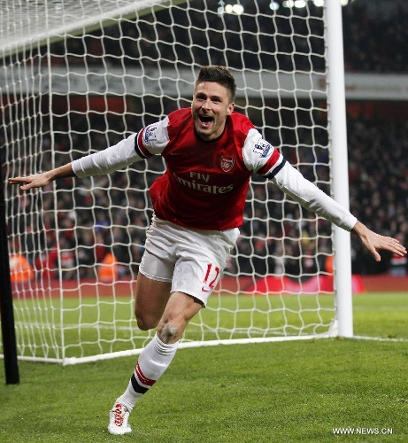 Oliver Giroud of Arsenal celebrates his second goal during the English Premier League football match between Arsenal and West Ham United at the Emirates Stadium in London, Britain, on Jan. 23, 2013. Arsenal won 5-1.(Xinhua/Wang Lili)&nbsp; 