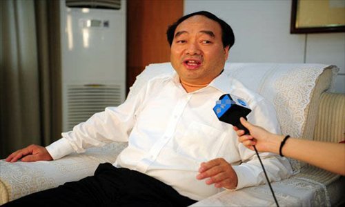 Lei Zhengfu, former Party chief of Chongqing's Beibei district, gives an interview to an unknown reporter. Lei was sacked Friday. Photo: Courtesy of cnhubei.com