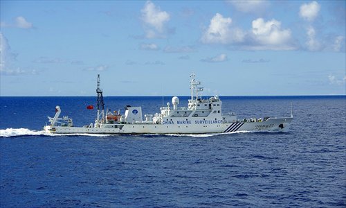 A Chinese marine surveillance ship cruises near the Diaoyu Islands in the East China Sea on Friday. Six Chinese ships sailed into waters around the islets to demonstrate China's jurisdiction over the Diaoyu Islands and its affiliated islets and ensure the country's maritime interests. Photo: AFP / Japan Coast Guard
