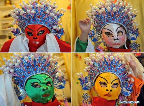 A combination photo shows the four masks three-year-old Shi Zhixuan changed during practice at home in Guilin, a tourist resort in Southwest China's Guangxi Zhuang Autonomous Region, August 20, 2012. Face change is a famous skill mostly used in Sichuan Opera to demonstrate sudden changes of the role's emotions. Shi Zhixuan started to learn the skills of changing face half a year ago, and now she has a good command of face changes in four categories. Photo: Xinhua