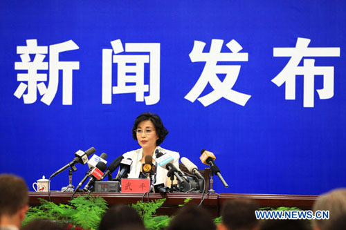 Wu Ping, spokeswoman for China's manned space program, makes remarks at a press conference held by China's manned space docking program headquarters at the Jiuquan Satellite Launch Center in Jiuquan, northwest China's Gansu Province, June 15, 2012. The Shenzhou-9 manned spacecraft will be launched at 6:37 pm (1037 GMT) on June 16, 2012. Three astronauts, two male and one female, will board China's fourth manned spacecraft to fulfill the country's first manned space docking mission. They are Jing Haipeng, Liu Wang and Liu Yang who is female, according to the headquarters. Photo: Xinhua