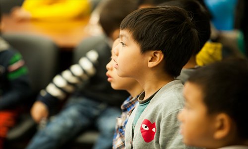 Children in a book reading session at the Daning community center. Photos: Courtesy of Shanghai Oriental Digital Community