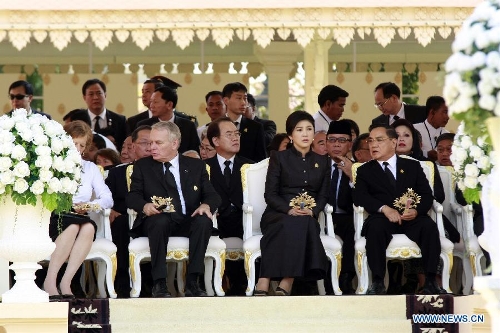 French Prime Minister Jean-Marc Ayrault (2nd L, front), Thai Prime Minister Yingluck Shinawatra (2nd R, front), and Laos Prime Minister Thongsing Thammavong (1st R, front) attend the cremation ceremony of late Cambodian King Father Norodom Sihanouk in Phnom Penh, Cambodia, Feb. 4, 2013. Cambodia began to cremate the body of the country's most revered King Father Norodom Sihanouk on Monday evening after it had been lying in state for more than three months at the capital's royal palace. (Xinhua/Sovannara) Related:Cambodia begins to cremate ex-King Norodom SihanoukPHNOM PENH, Feb. 4 (Xinhua) -- Cambodia began to cremate the body of the country's most revered King Father Norodom Sihanouk on Monday evening after it had been lying in state for more than three months at the capital's royal palace.The cremation was made at the Veal Preah Meru Square next to the Royal Palace in an elaborate Buddhist ceremony. Full story