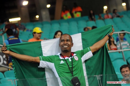 A fan of Nigeria reacts prior to the FIFA's Confederations Cup Brazil 2013 match against Uruguay in Salvador, Brazil, on June 20, 2013. Uruguay won 2-1. (Xinhua/Nicolas Celaya)  &nbsp;&nbsp;