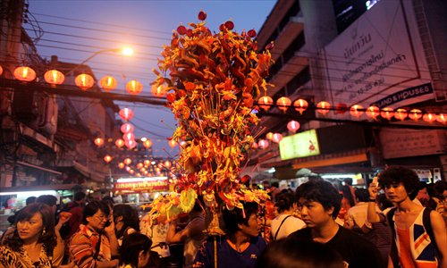 Thais celebrate the Year of the Snake in Bangkok's Chinatown area during Chinese New Year on February 9. Photo CFP