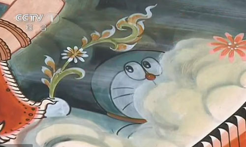 Japanese cartoon character Doraemon appears in murals at the Wat Sampa Siw temple, Thailand. Photos: screen shot of CCTV