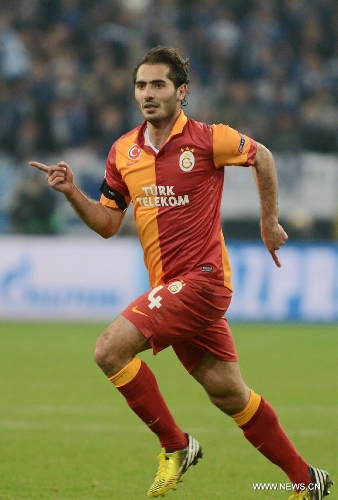 Hamit Altintop of Galatasaray celebrates during the UEFA Champions League eighth-final match against FC Schalke 04 at Veltins Arena in Gelsenkirchen, west Germany, March 12, 2013. Galatasaray won 3-2 and entered the quarterfinal. (Xinhua/Ma Ning) 