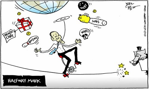 Simplicity is the basic element in Joel Pett's cartoons. Photos: Courtesy of Joel Pett