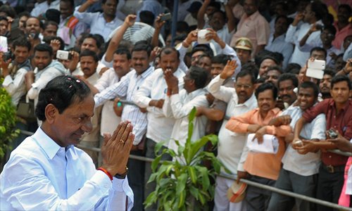Telangana state's first Chief Minister K. Chandrasekhar Rao greets supporters during the celebrations on Monday. India's new Prime Minister Narendra Modi promised his 