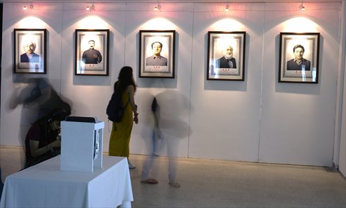 Photos show Jiang Chunlin in different masks at the Art Museum of CAFA. Photo: Courtesy of Jiang Chunlin