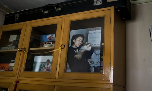Photos in the family home in Beijing show Zhu before she was poisoned.Photos: CFP