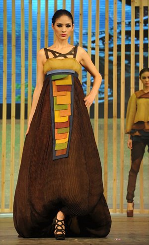 Ethnic minority designs are meeting with high fashion on China’s catwalks. Photos: CFP 

