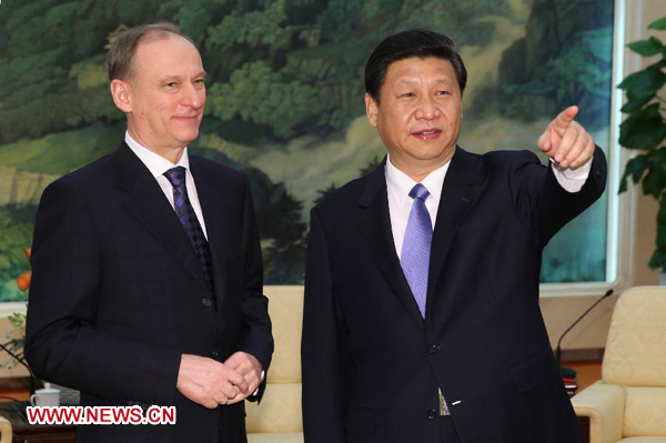 Xi Jinping (R), general secretary of the Communist Party of China Central Committee, meets with Russian Security Council Secretary Nikolai Patrushev in Beijing, capital of China, Jan. 8, 2013. Photo: Xinhua