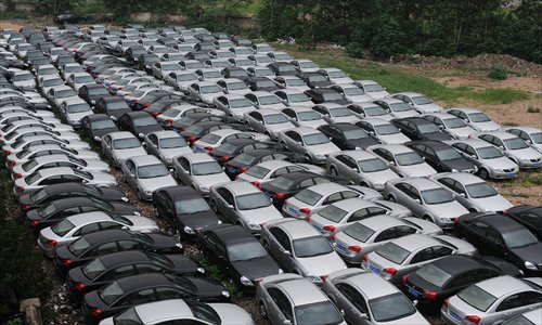 For the past two weeks, 200-plus Buicks have been parked at an abandoned 0.5 hectare-demolition site, in Jianghan district, Wuhan, Hubei Province. No one knows who owns the cars, but residents fear they are a hazard because they might catch fire under the hot sun. Photo: CFP 