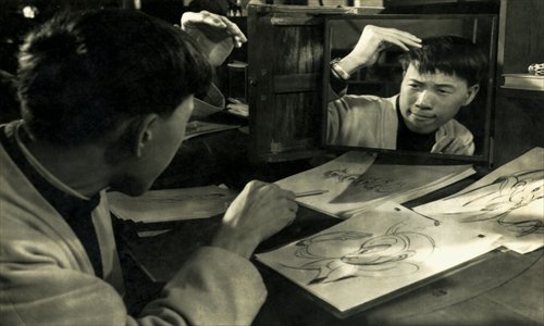 Yan Dingxian works on sketches for the Monkey King. Photo: Courtesy of Shanghai Animation Film Studio
