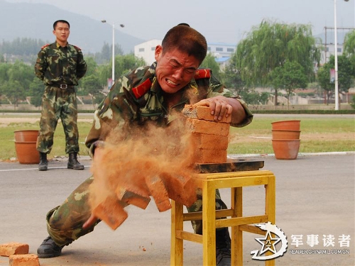 The Tai'an Detachment of the Chinese People's Armed Police Force (APF) organized 30 special operation members to conduct a military skills training, in a bid to further enhance their combat capability in complex environment. They completed many training subjects, such as the special tactics, precision shooting, hard qigong and anti-hijacking force assault. Although their average age is only 20 years old, they have undertaken the security work for several major events. (Photo: China Military Online/People's Daily Online)