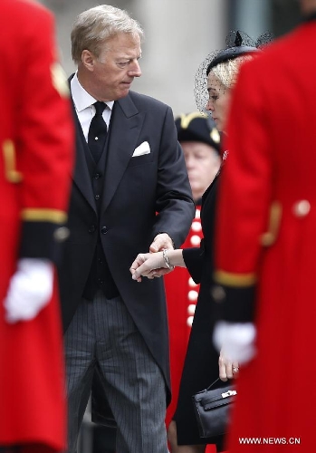 Mark Thatcher, the son of former British Prime Minister Margaret Thatcher, arrives for the funeral of former Baroness Thatcher, outside St. Paul's Cathedral in London, Britain, April 17, 2013. The funeral of Margaret Thatcher, the first female British prime minister, started 11 a.m. local time on Wednesday in London. (Xinhua/Wang Lili)