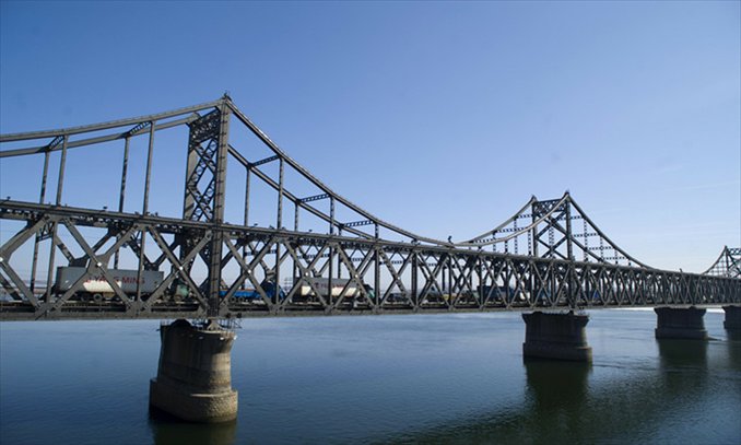 The China-North Korea Friendship Bridge crosses the Yalu River, linking Dandong, Northeast China's Liaoning Province, and North Korea's second largest city, Sinuiju. Nearly 80 percent of all bilateral trade goes through Dandong. Photo: CFP