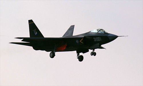 China’s second stealth fighter, dubbed J-31, makes its maiden flight Wednesday in Shenyang, Liaoning Province. Photo: Pan Bin