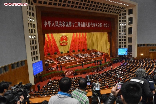 The fourth plenary meeting of the first session of the 12th National People's Congress (NPC) is held at the Great Hall of the People in Beijing, capital of China, March 14, 2013. Chairman, vice-chairpersons, secretary-general and members of the 12th NPC Standing Committee, president and vice-president of the state, and chairman of the Central Military Commission of the People's Republic of China will be elected here on Thursday. (Xinhua/Wang Song)